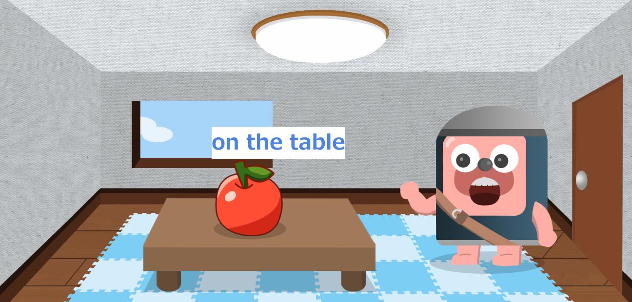 There is an apple on the table.